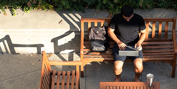 ManOnBench_MATOnline_578x291 Man on Bench with Laptop