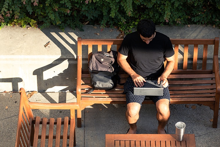 Man On Bench with laptop