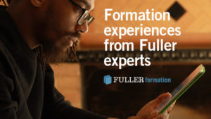 Andre Henry looking at content on cell phone for FULLER formation