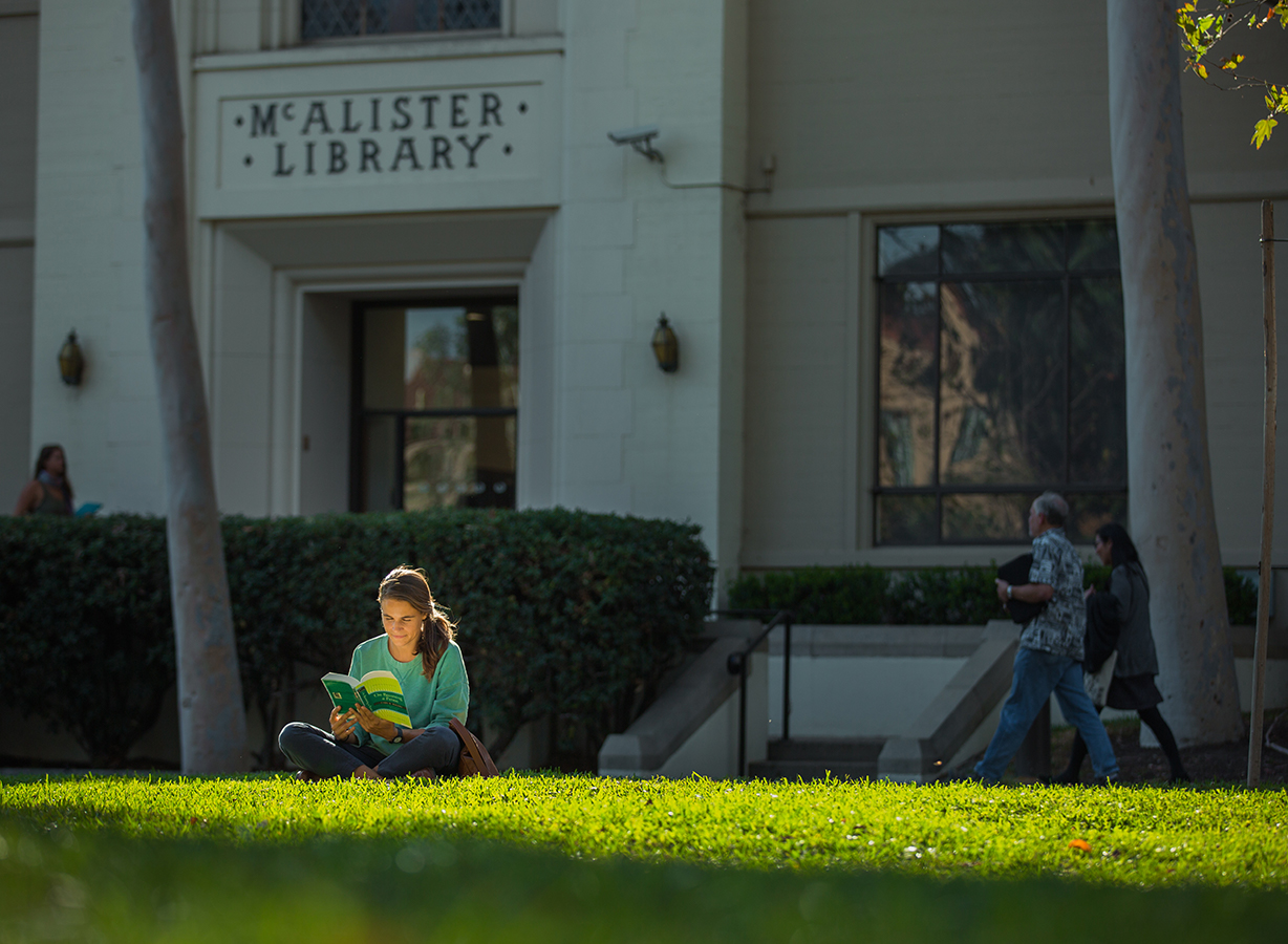 student studying outside