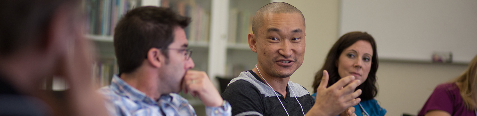 people talking in a relaxed classroom