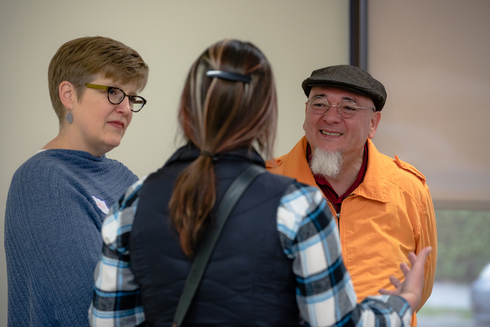 professors talking with a student