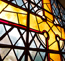 Stained glass image of a cross