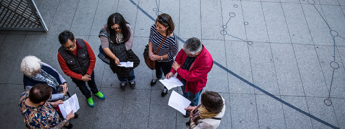 people talking in a circle banner